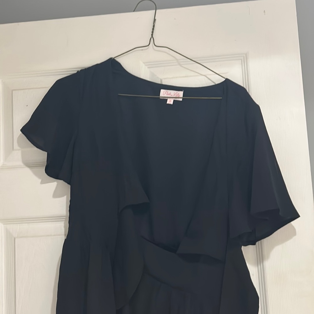 Black romper NEVER Worn